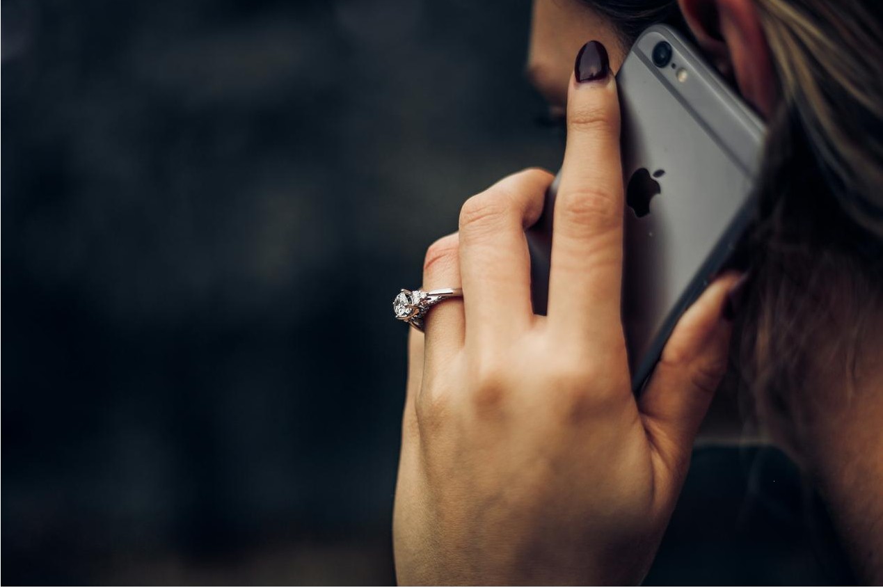 Family using mobile phones together